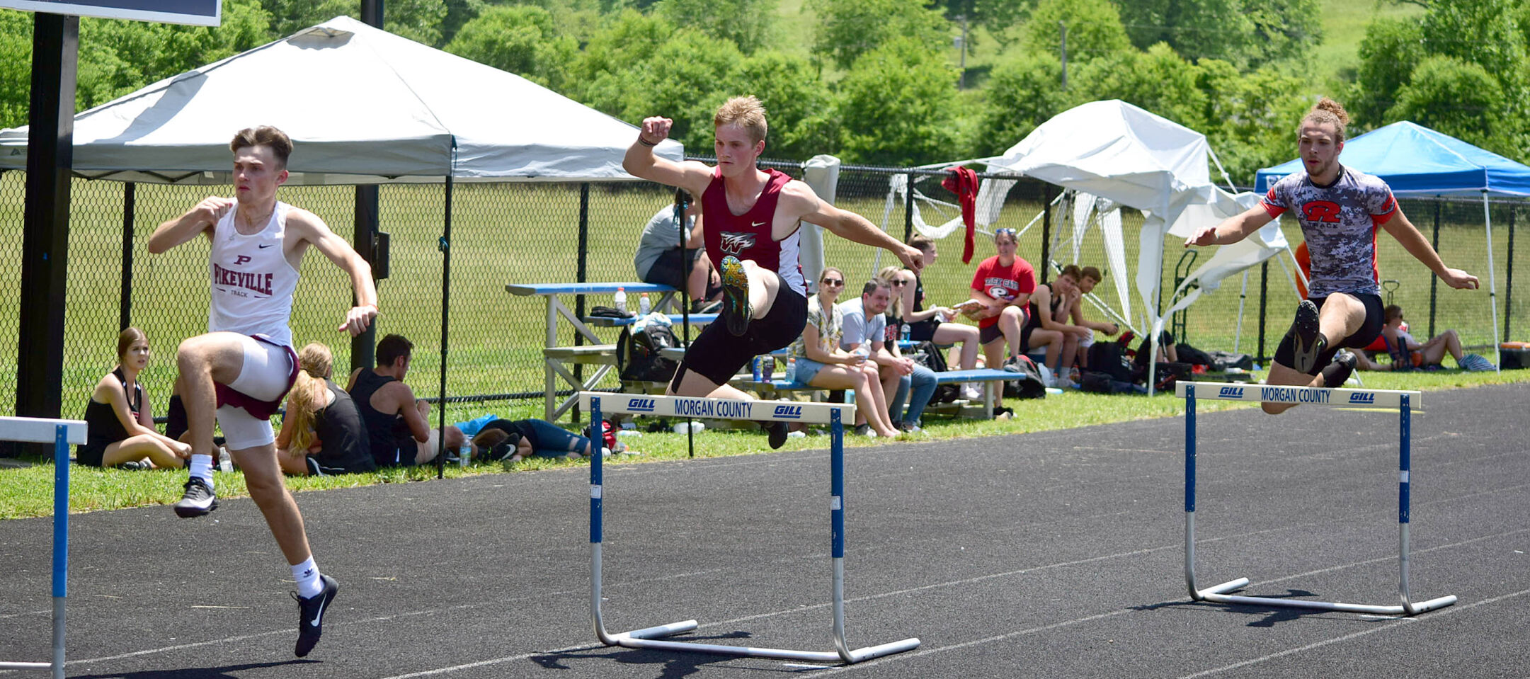 Trace Harper (West), Kendal Wright (Pikeville) & Will Nichols (Raceland) 300mH region btf.JPG